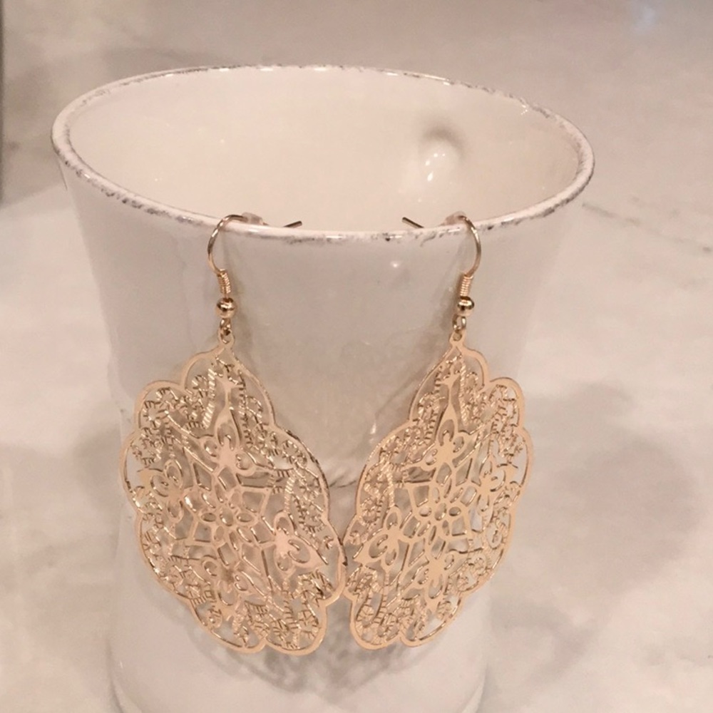 Gold dangling earrings